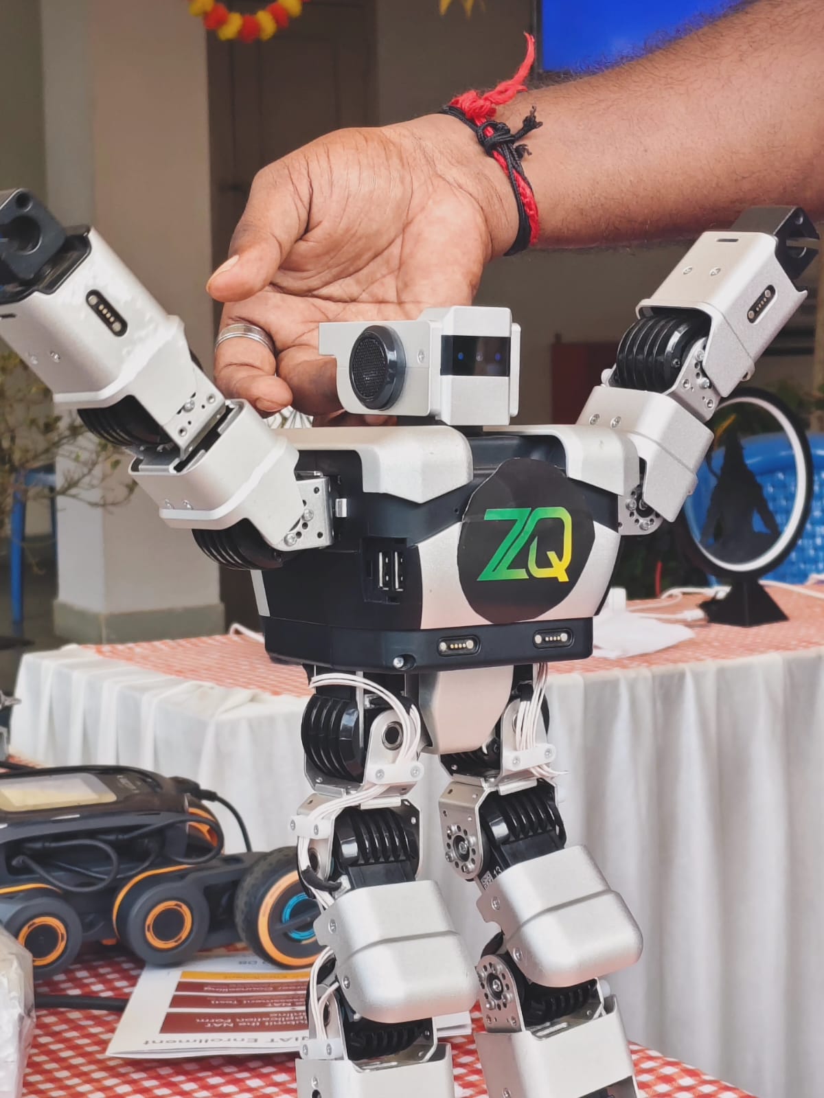Zentroniq Humanoid G1 robot posing on stage at a live showcase